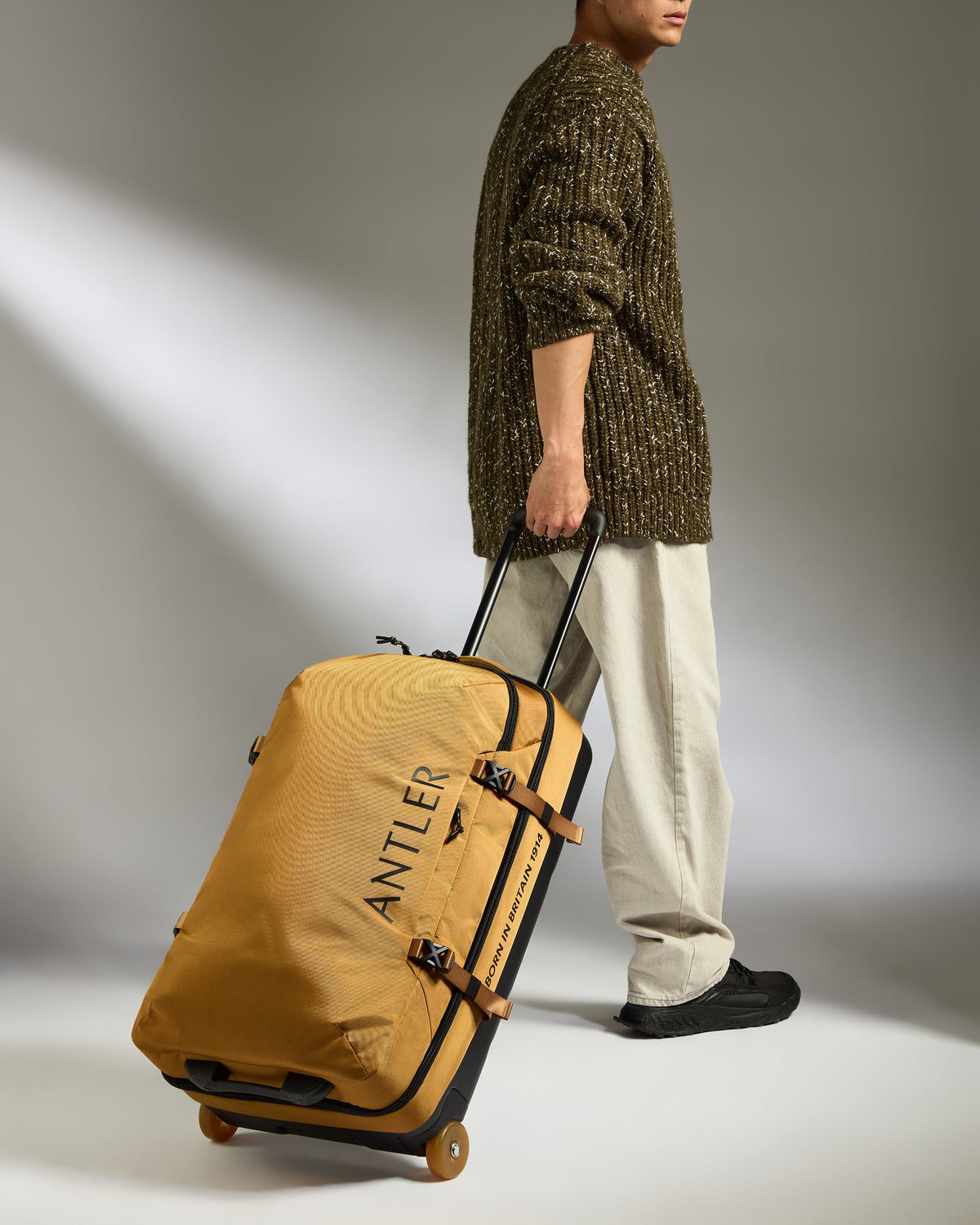 Discovery Wheeled Duffel in Mustard Yellow