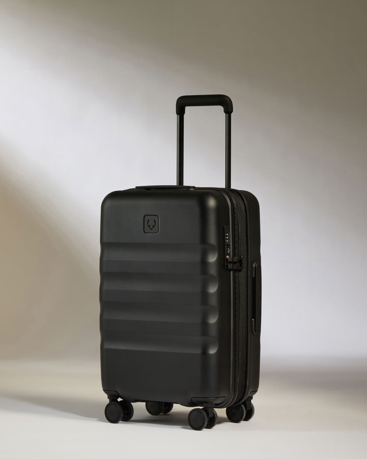 Expandable Carry-on Luggage in Black - Icon Stripe