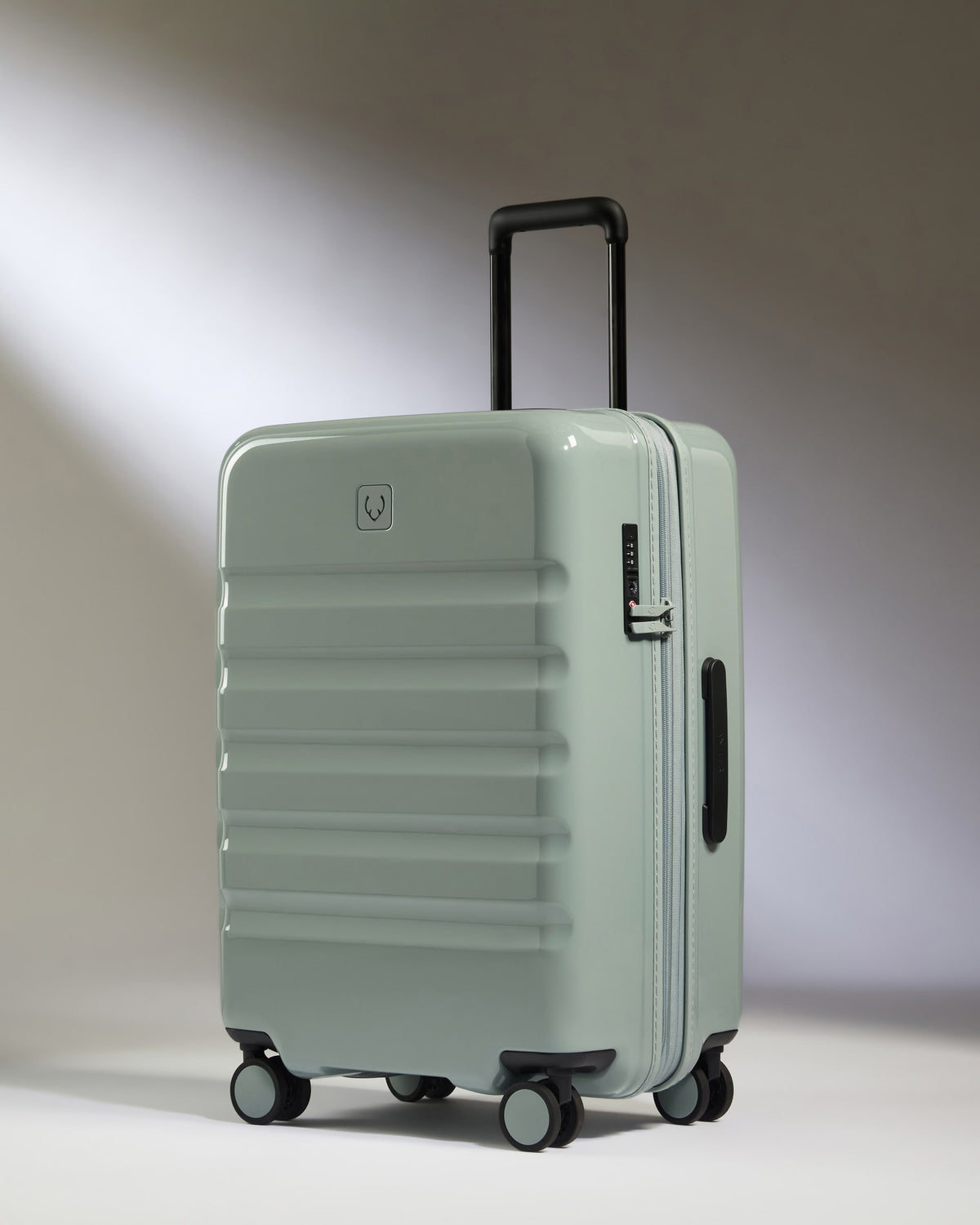 Medium Luggage in Mist Blue Gloss - Icon Stripe