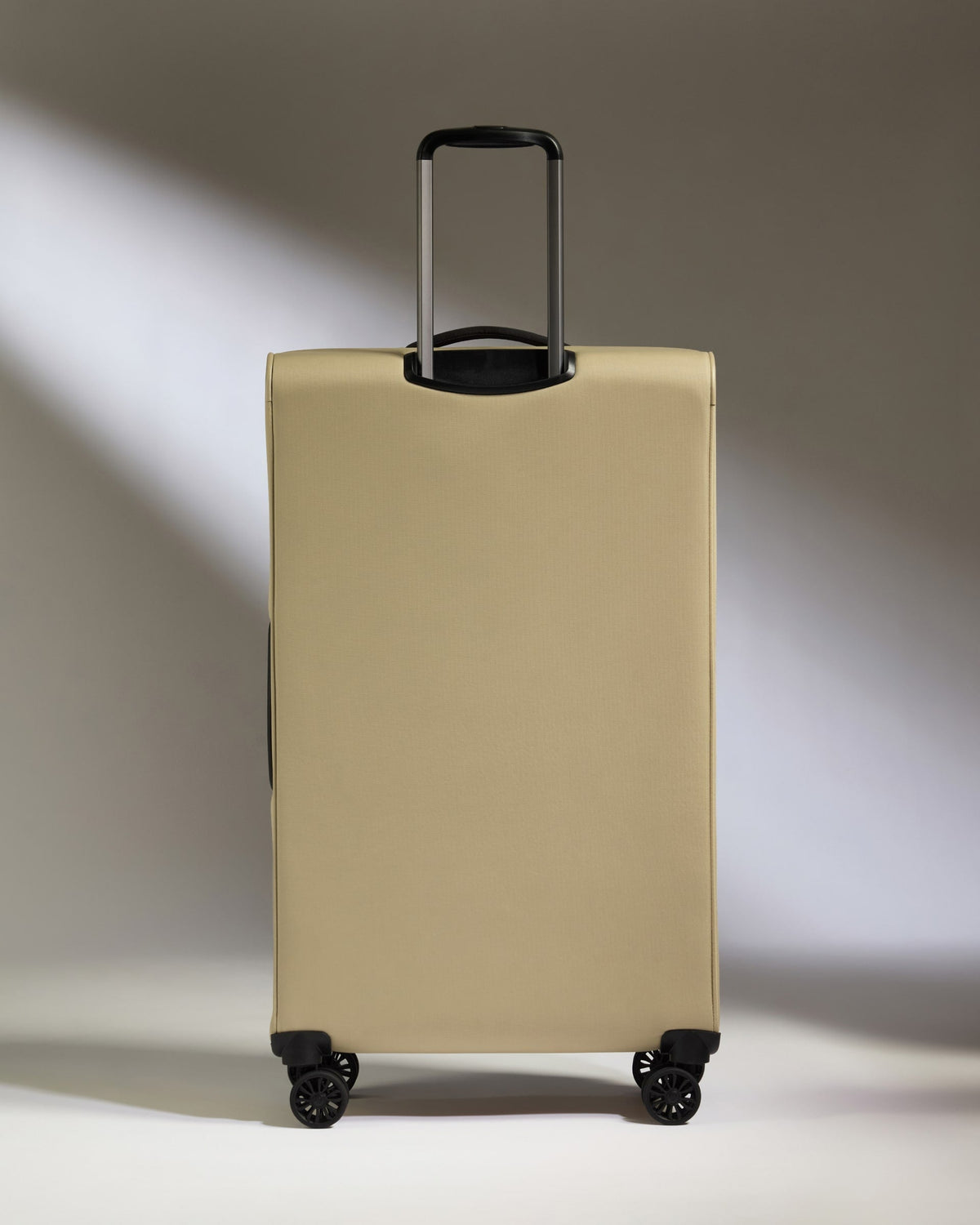 Lightest Large Luggage in Sand - Soft Stripe 2.0