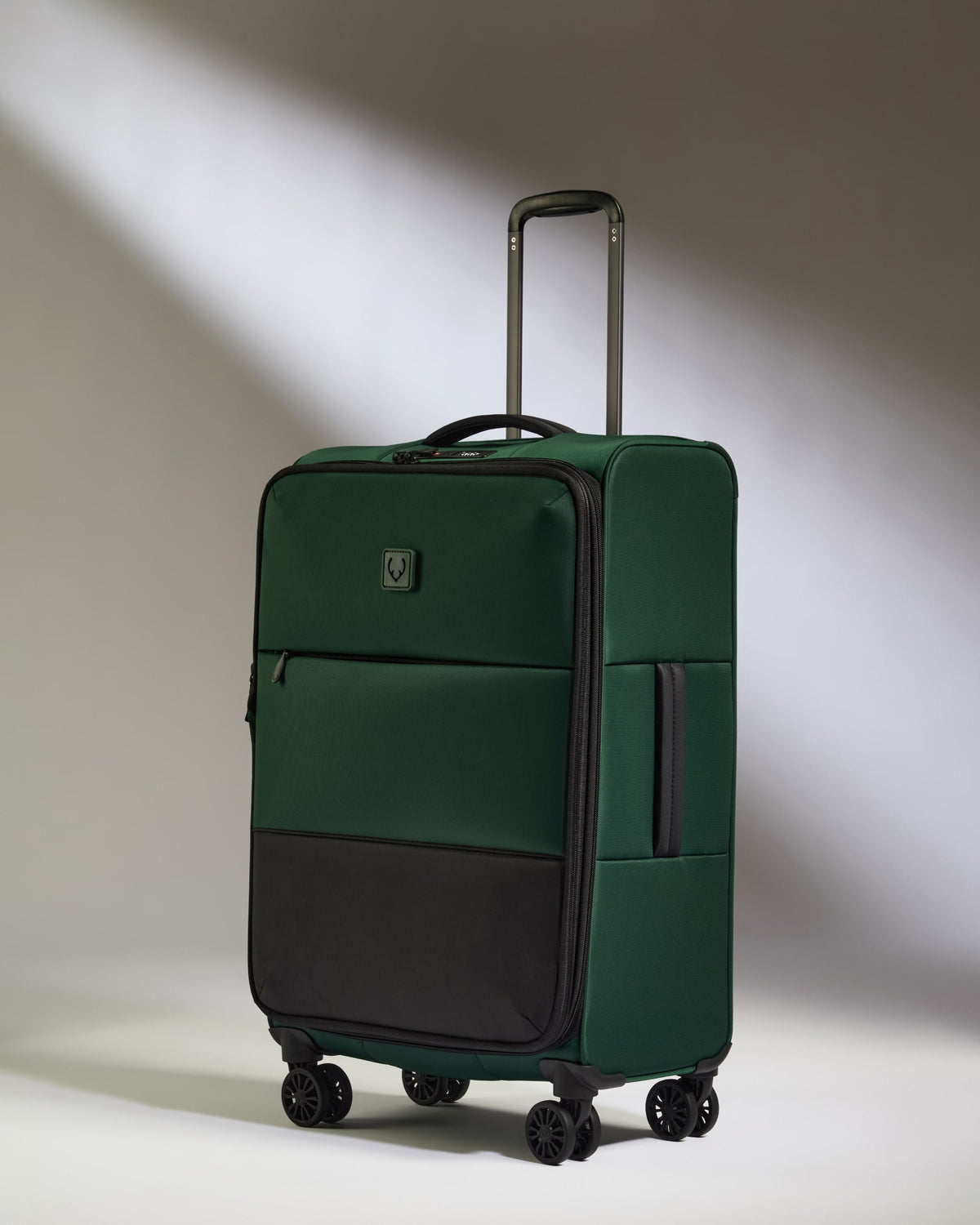Lightest Medium Luggage in Antler Green - Soft Stripe 2.0