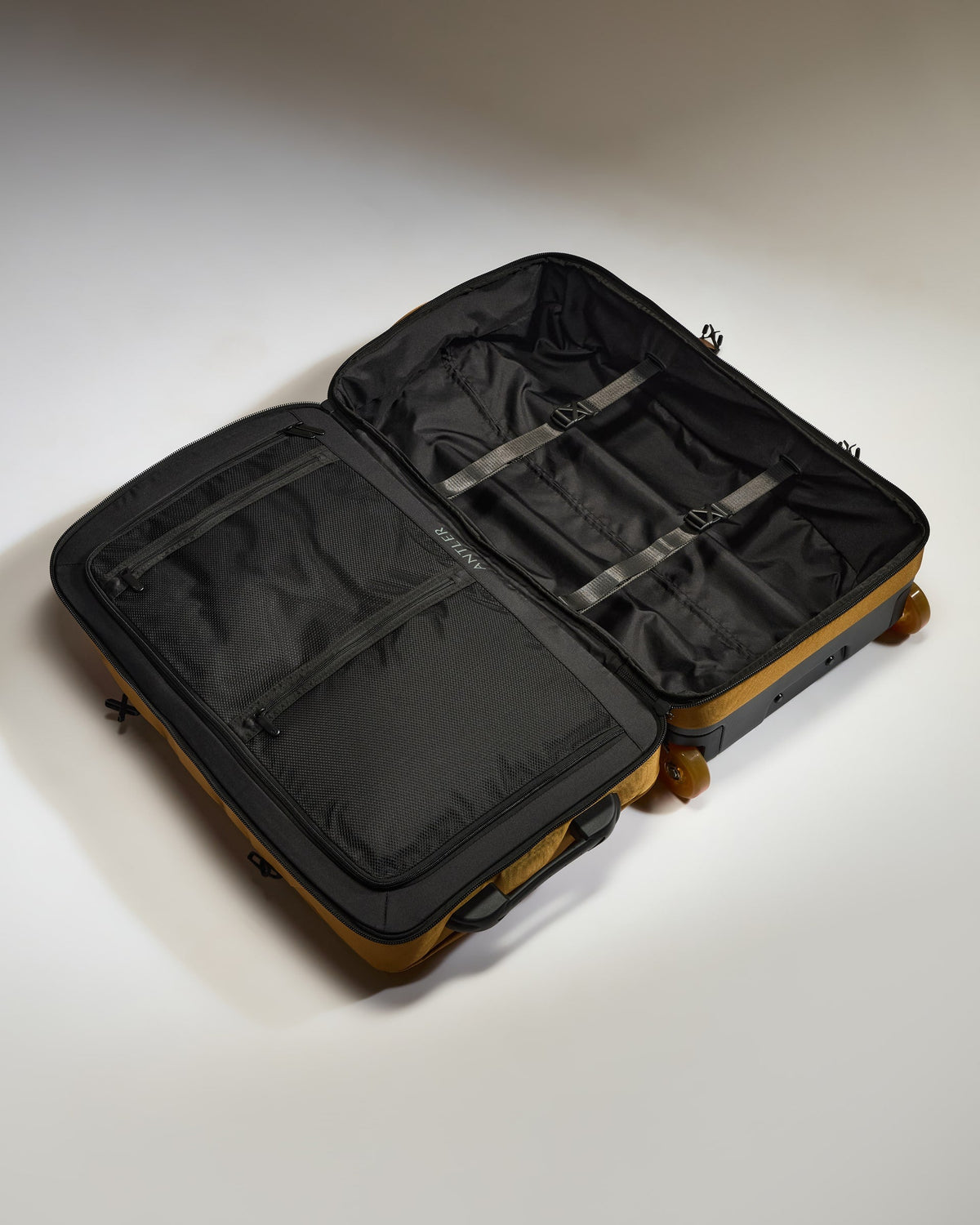 Discovery Wheeled Duffel in Mustard Yellow