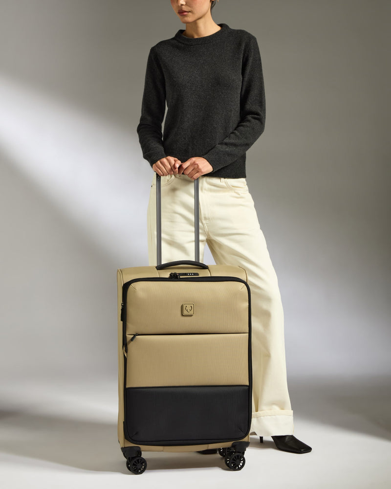 Lightest Medium Luggage in Sand - Soft Stripe 2.0